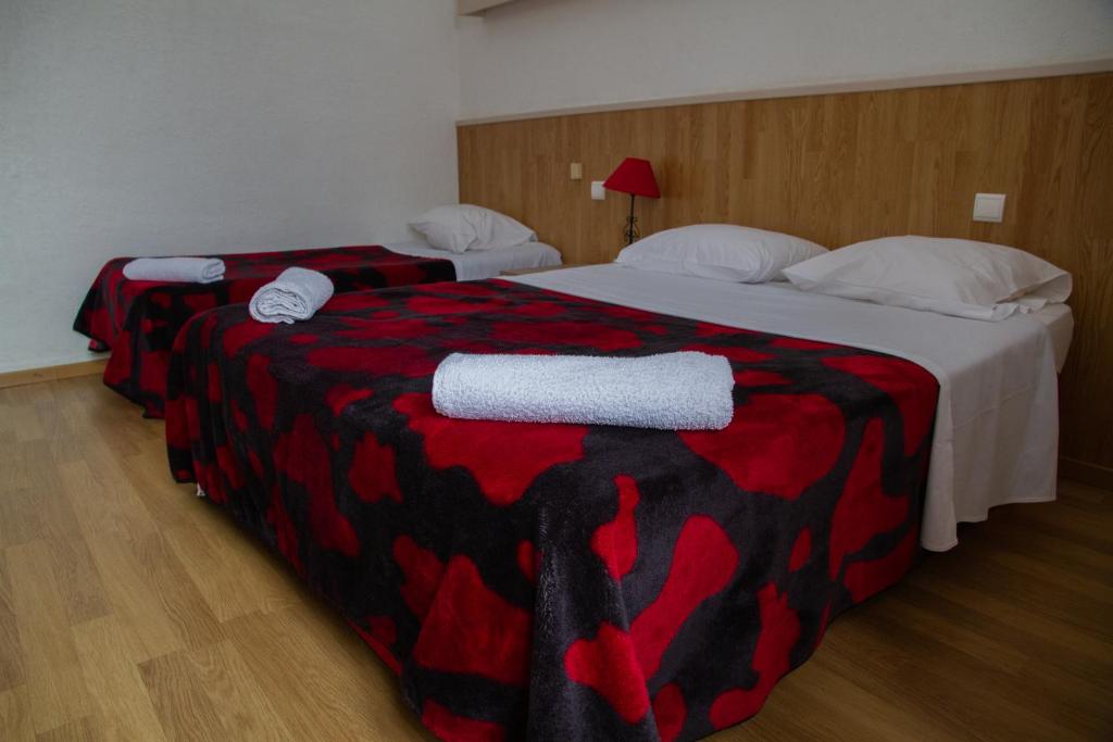 Postel nebo postele na pokoji v ubytování Hotel Durand Le Patio