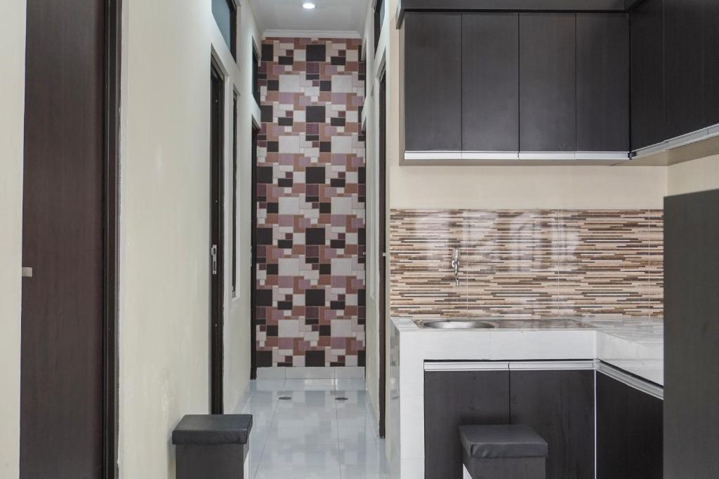 Fotografie z fotogalerie ubytování OYO 91646 fio colombus residence v destinaci Karawang