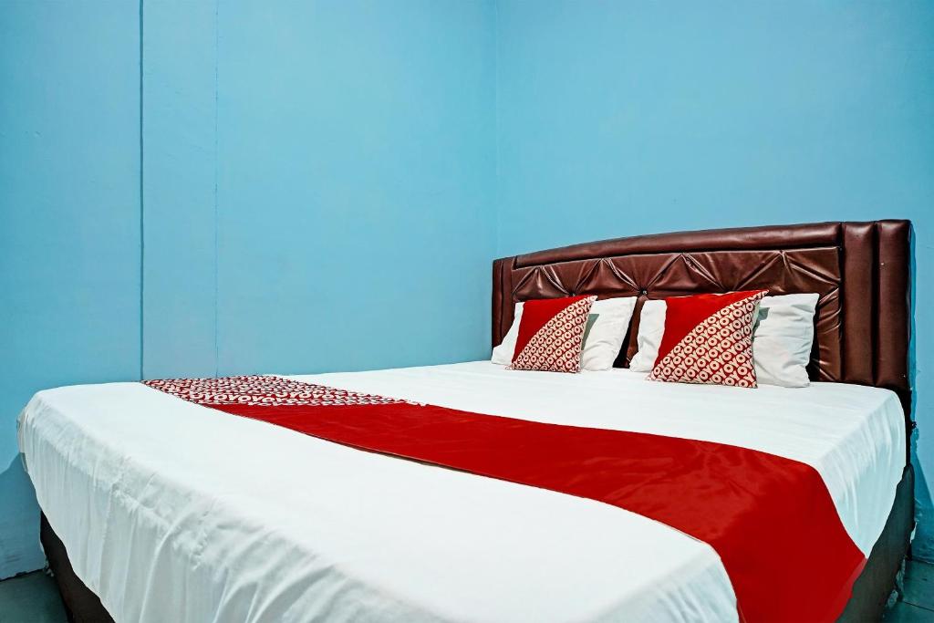 Postel nebo postele na pokoji v ubytování SPOT ON 91637 Hotel Adela