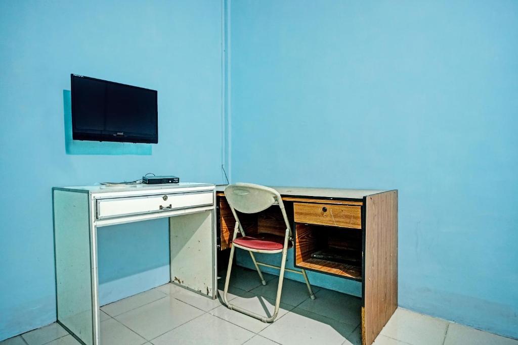 TV a/nebo společenská místnost v ubytování SPOT ON 91637 Hotel Adela