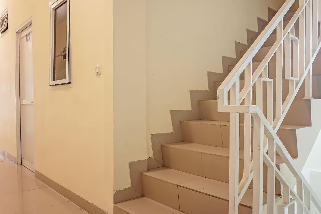 Fotografie z fotogalerie ubytování Super OYO Capital O 91790 S1 Residence v destinaci Tangerang