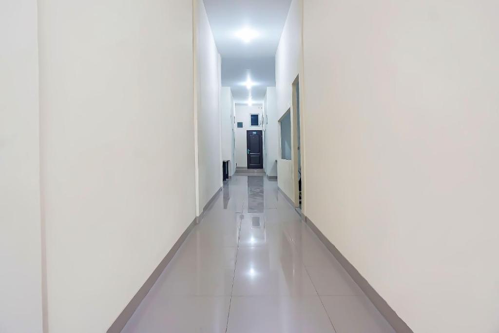 Fotografie z fotogalerie ubytování Super OYO Capital O 91790 S1 Residence v destinaci Tangerang