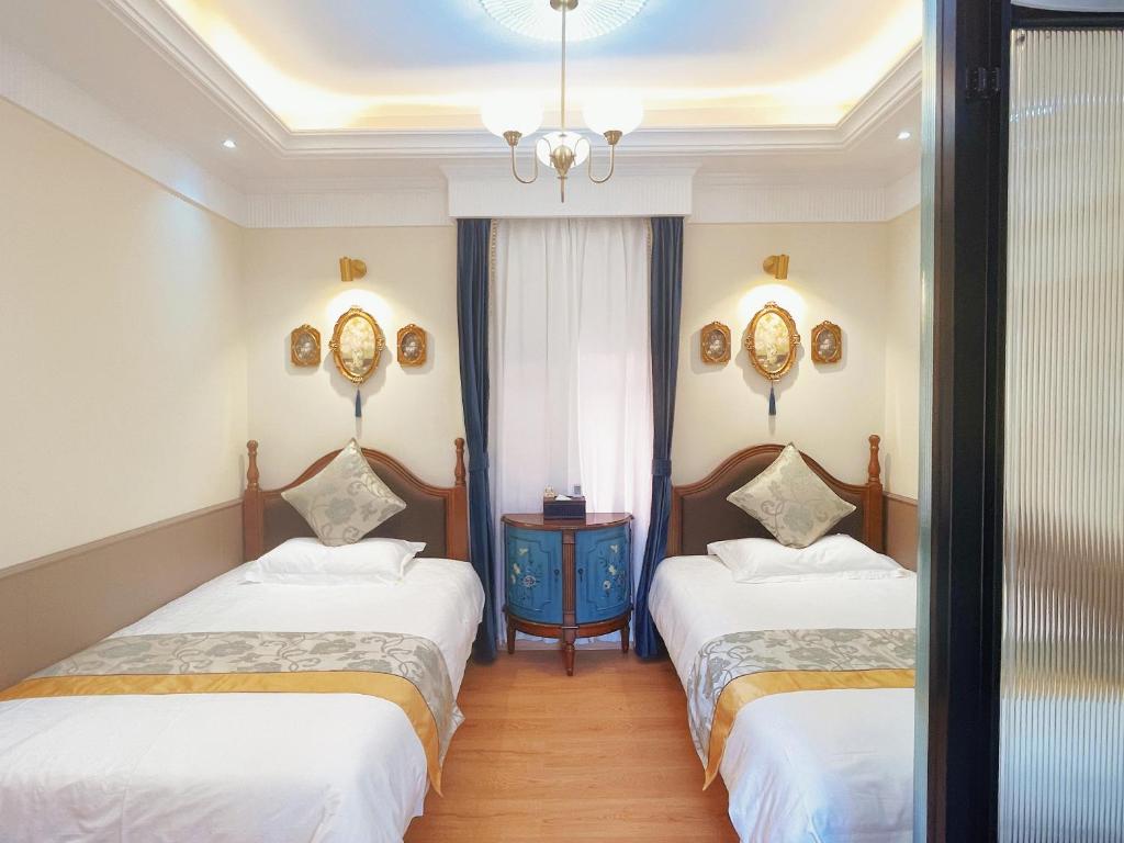 Gulta vai gultas numurā naktsmītnē Gulangyu Yuanzhongyuan Homestay