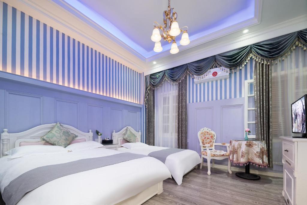 Gulta vai gultas numurā naktsmītnē Gulangyu Yuanzhongyuan Homestay