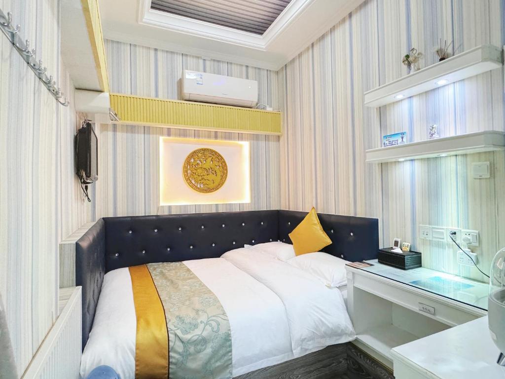 Gulta vai gultas numurā naktsmītnē Gulangyu Yuanzhongyuan Homestay