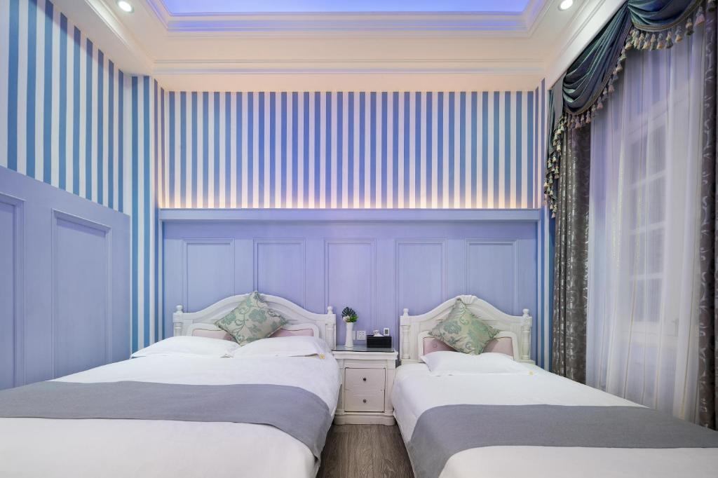 Gulta vai gultas numurā naktsmītnē Gulangyu Yuanzhongyuan Homestay