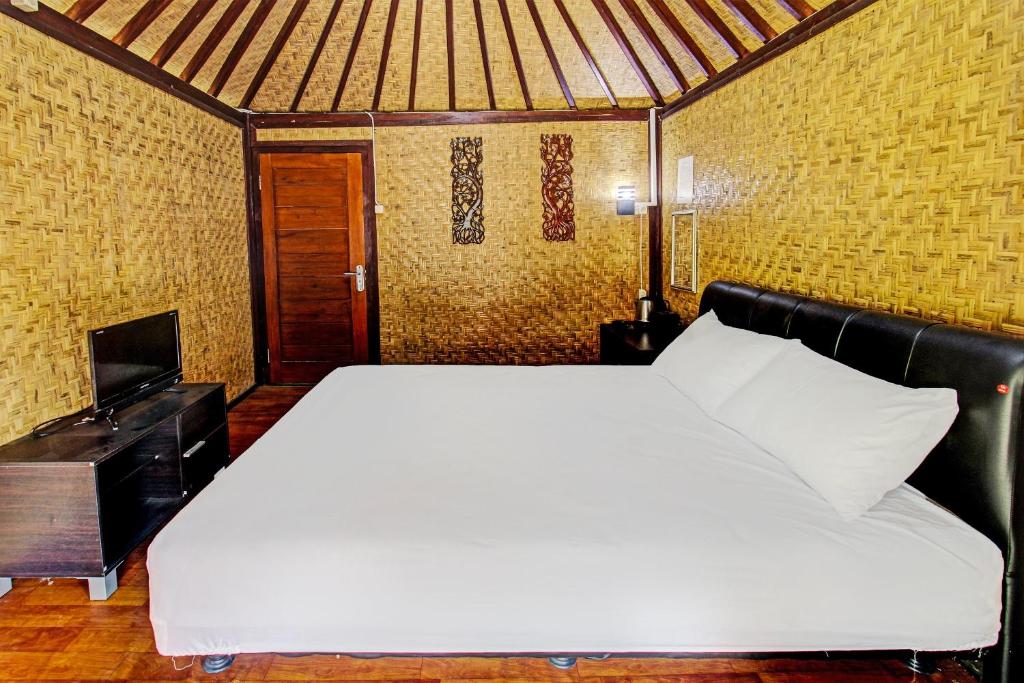 Postel nebo postele na pokoji v ubytování OYO 91830 Hotel Gemilang 2NearBukit Pergasingan
