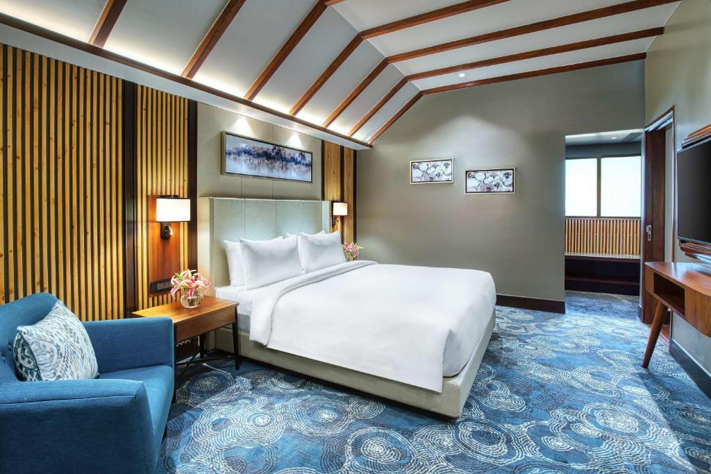 Postel nebo postele na pokoji v ubytování Radisson Blu Resort Dharamshala