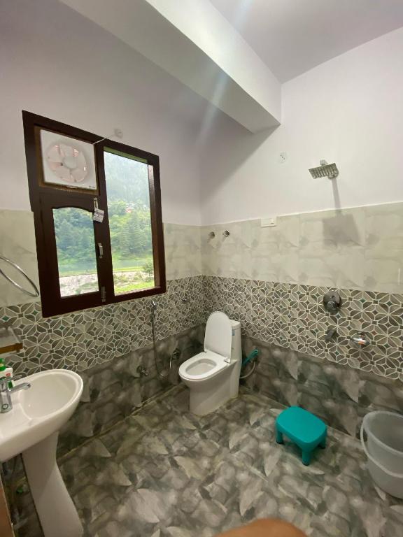 Koupelna v ubytování Hotel Manik