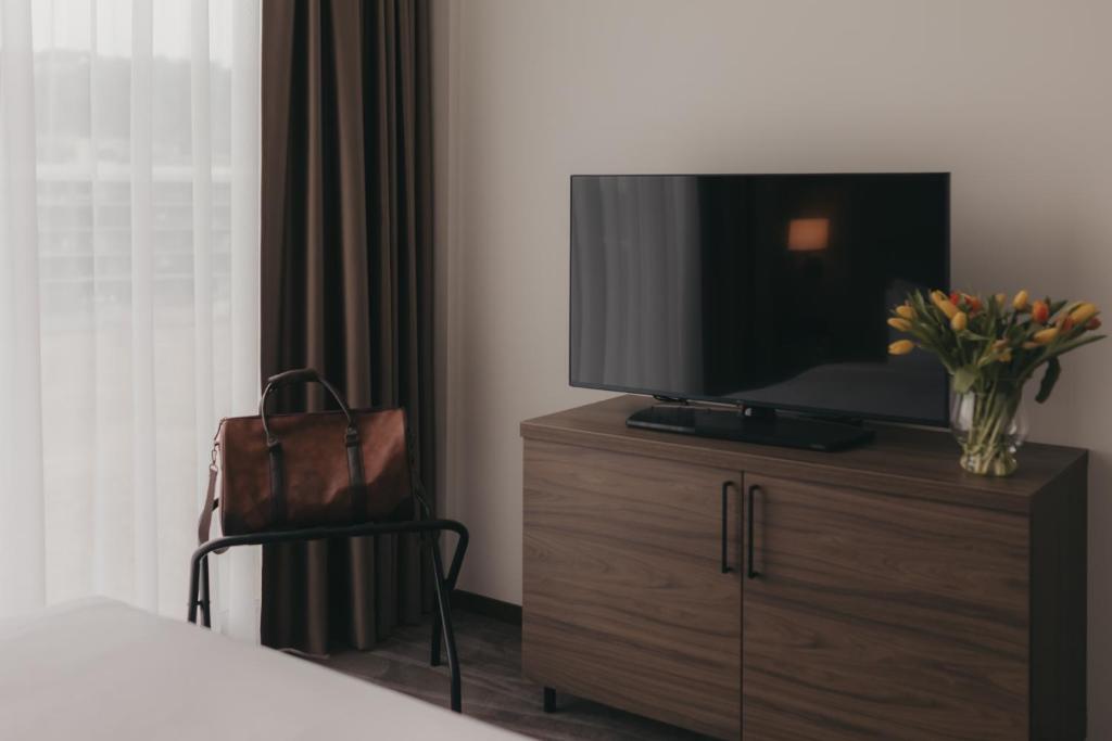 TV a/nebo společenská místnost v ubytování IIP Apartments - Self Check-In