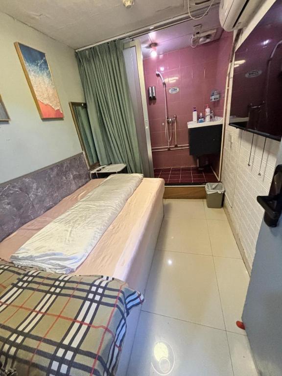 Postel nebo postele na pokoji v ubytování Mabo hotel