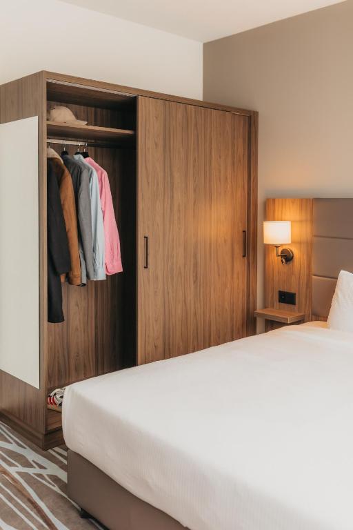 Postel nebo postele na pokoji v ubytování IIP Apartments - Self Check-In