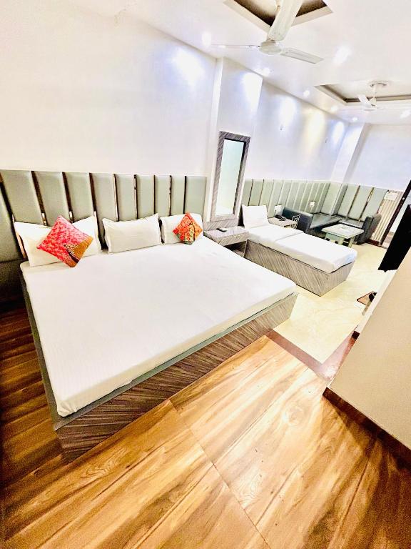 Postel nebo postele na pokoji v ubytování Hotel Amrit Villa