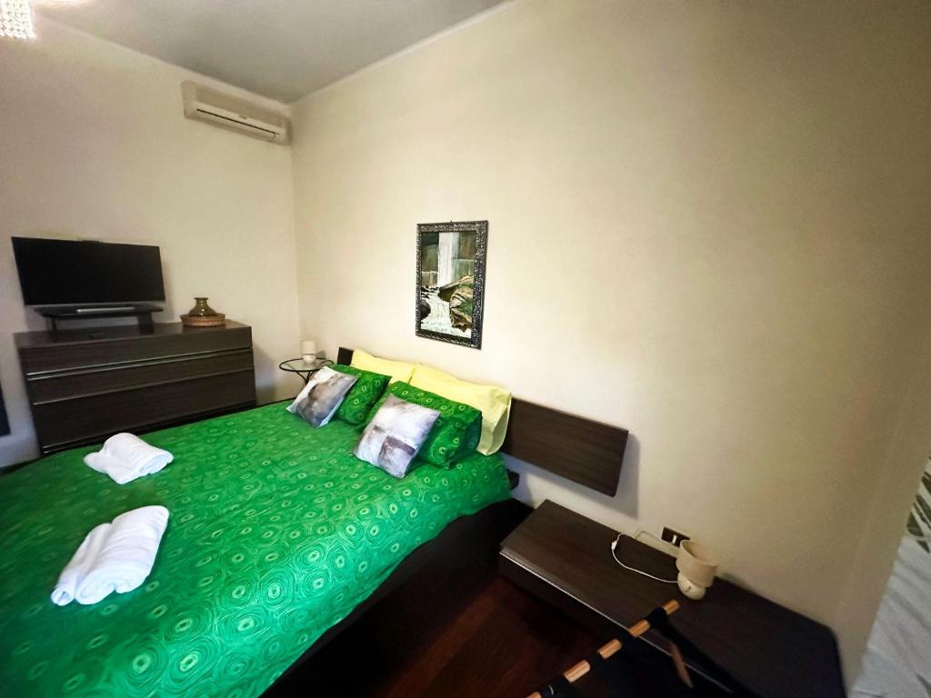 Ένα ή περισσότερα κρεβάτια σε δωμάτιο στο La casa di Fred