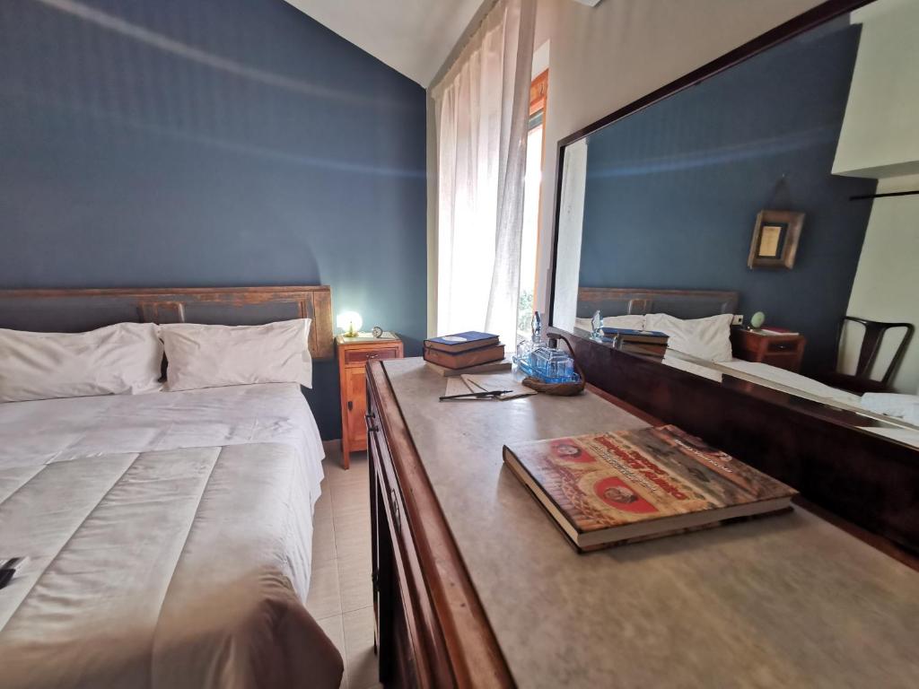 Posteľ alebo postele v izbe v ubytovaní Locanda Tanè