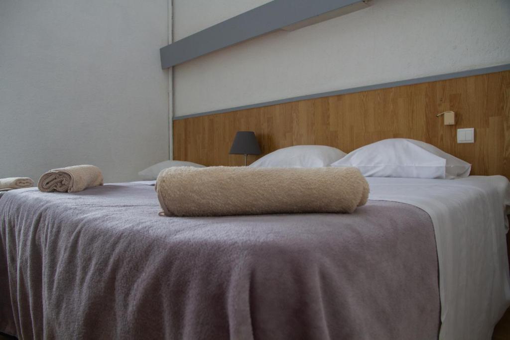Postel nebo postele na pokoji v ubytování Hotel Durand Le Patio