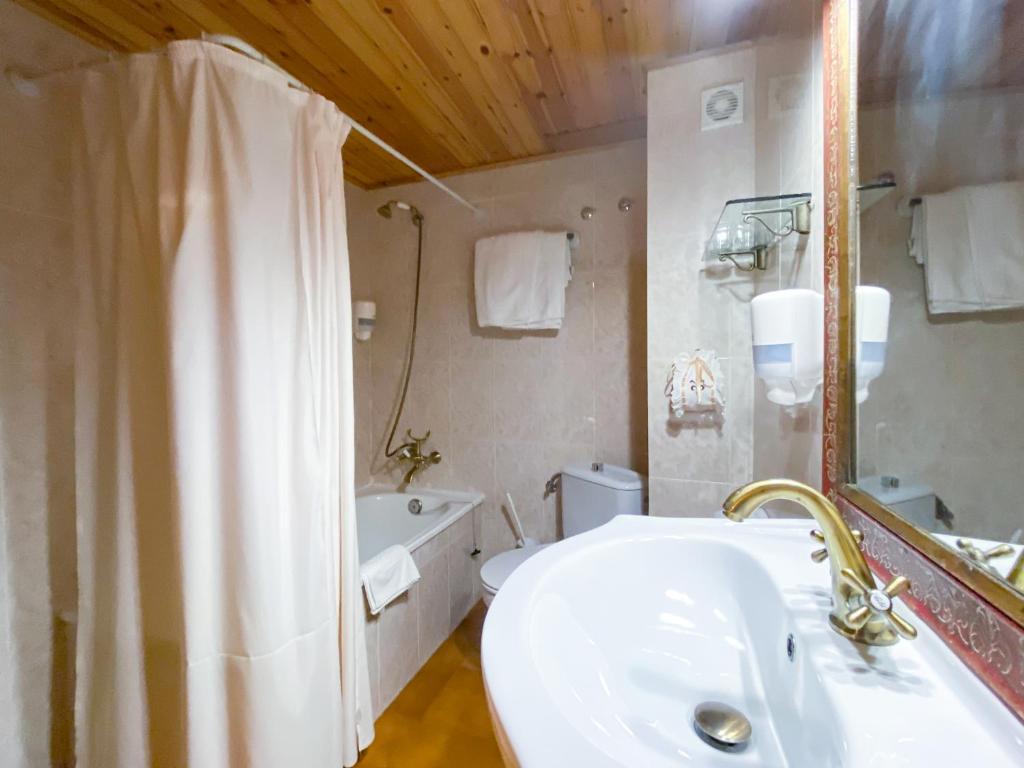 Ένα μπάνιο στο Casa Rural Macia - Apartamentos