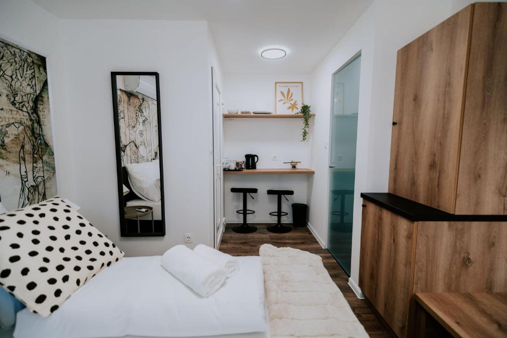 Postel nebo postele na pokoji v ubytování Maison de Luxe
