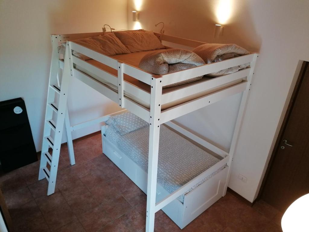 Postel nebo postele na pokoji v ubytování Villa Madi
