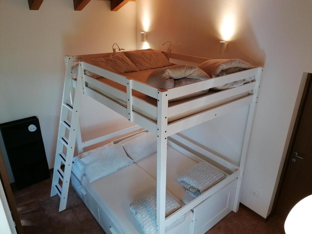 Postel nebo postele na pokoji v ubytování Villa Madi