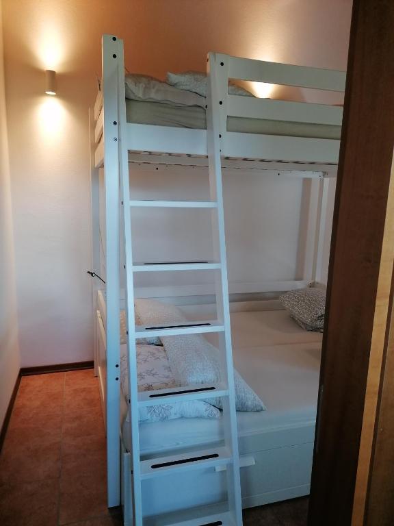 Postel nebo postele na pokoji v ubytování Villa Madi