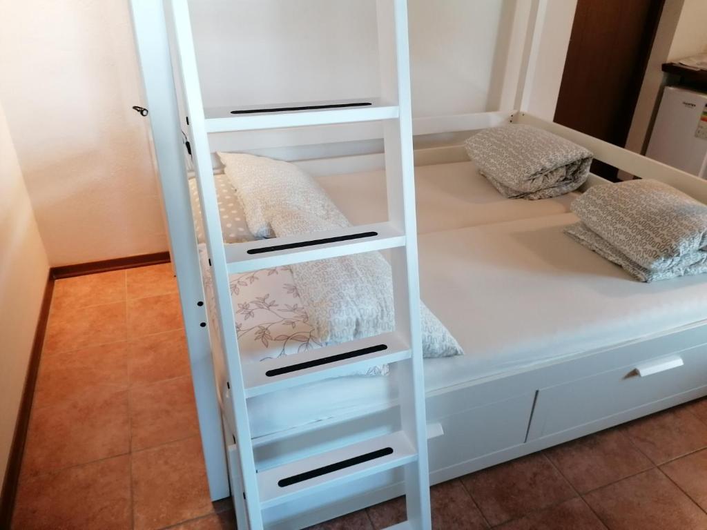 Postel nebo postele na pokoji v ubytování Villa Madi