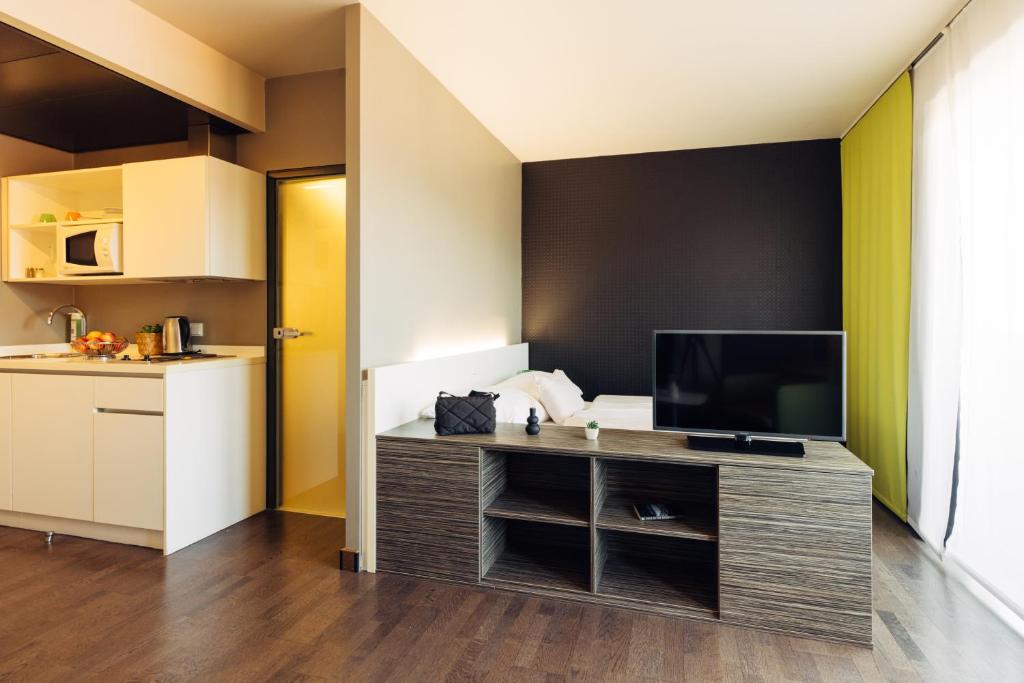 Kuchyň nebo kuchyňský kout v ubytování harry's home Hart bei Graz hotel & apartments
