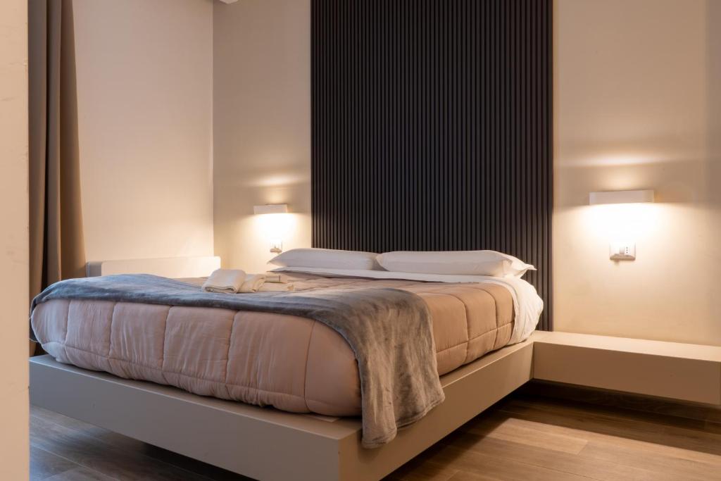 Postel nebo postele na pokoji v ubytování House Room Civico 56