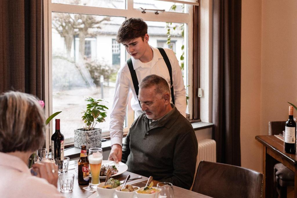 Nápoje v ubytování Landhotel De Hoofdige Boer