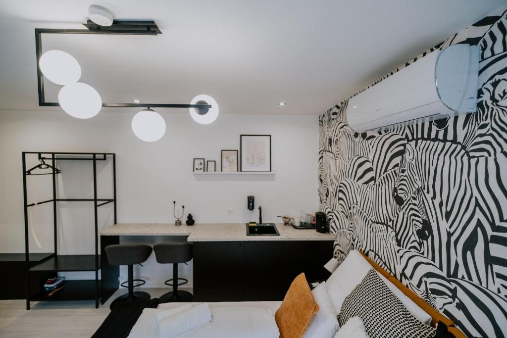 Postel nebo postele na pokoji v ubytování Maison de Luxe
