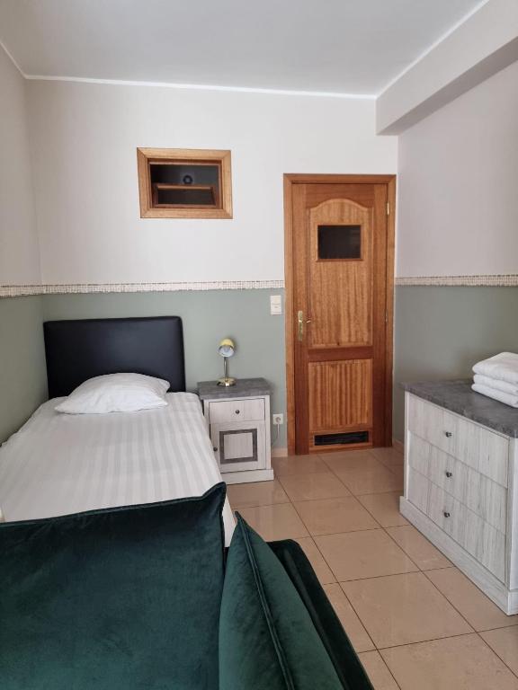 Postel nebo postele na pokoji v ubytování Aparthotel Résidence Bara Midi
