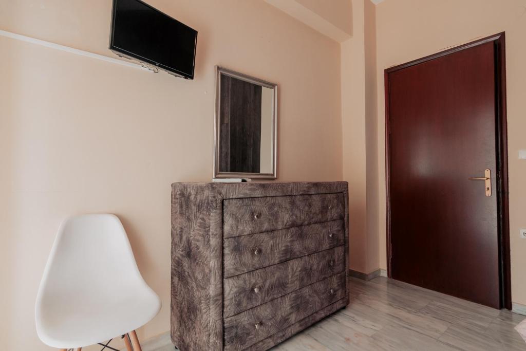 Telewizja i/lub zestaw kina domowego w obiekcie Family Holiday House In Nafplio