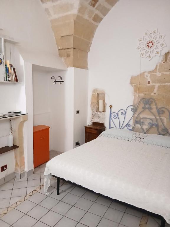 Postel nebo postele na pokoji v ubytování Vico del Sole b&b