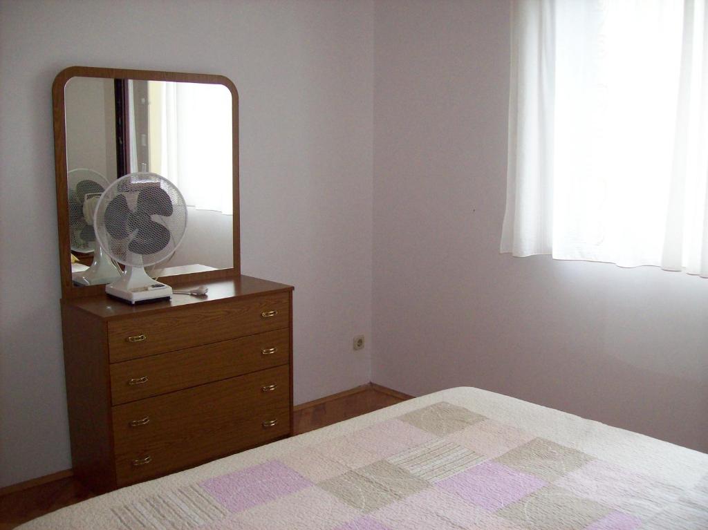 Postel nebo postele na pokoji v ubytování Apartment Monfiorenzo 11