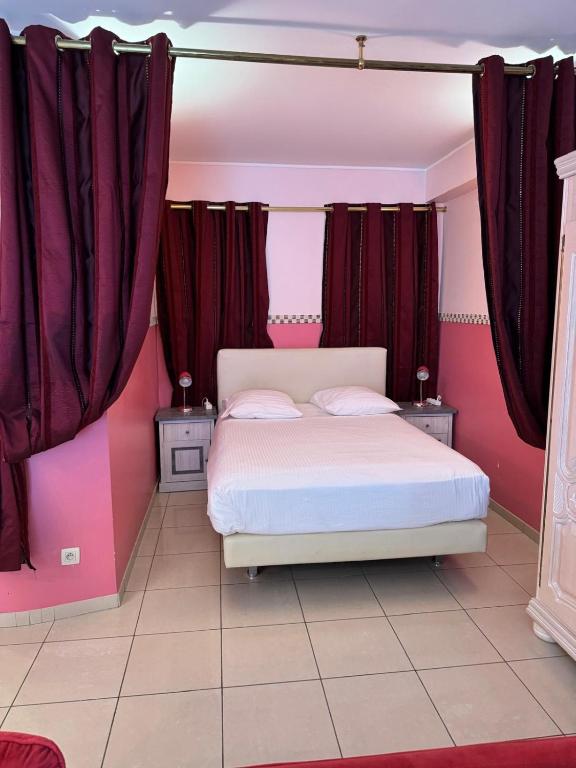 Postel nebo postele na pokoji v ubytování Aparthotel Résidence Bara Midi