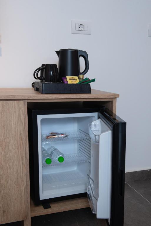 Kuchyň nebo kuchyňský kout v ubytování Evia Hotel