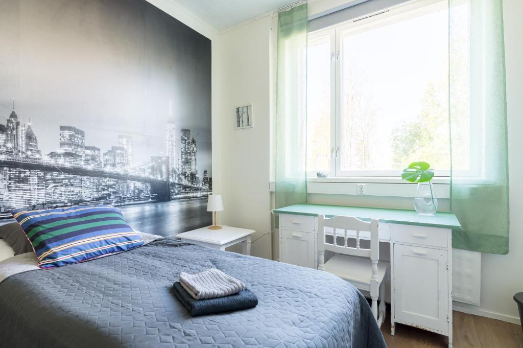Vuode tai vuoteita majoituspaikassa Kangaskoti
