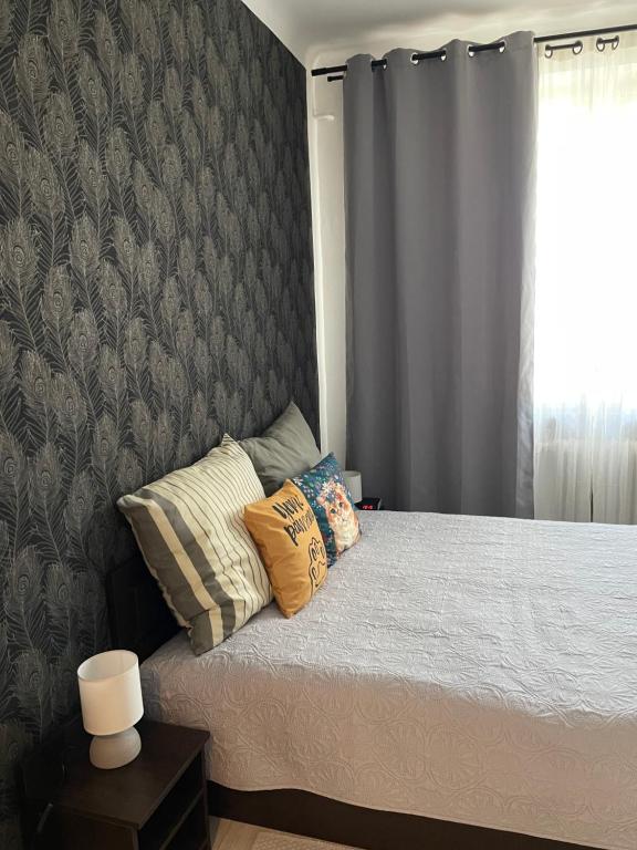 Posteľ alebo postele v izbe v ubytovaní Centrum Apartment Lipowa 12