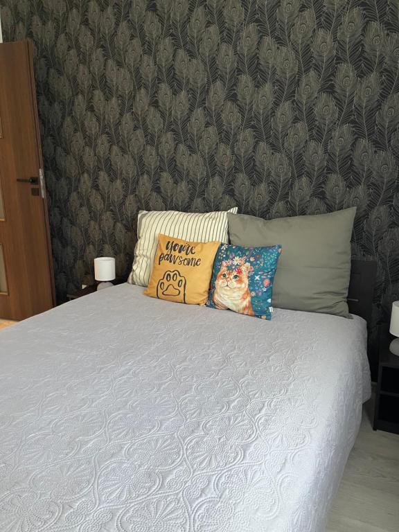 Posteľ alebo postele v izbe v ubytovaní Centrum Apartment Lipowa 12