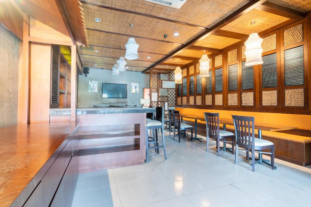 Restaurace v ubytování Super OYO Flagship 91863 Metro House