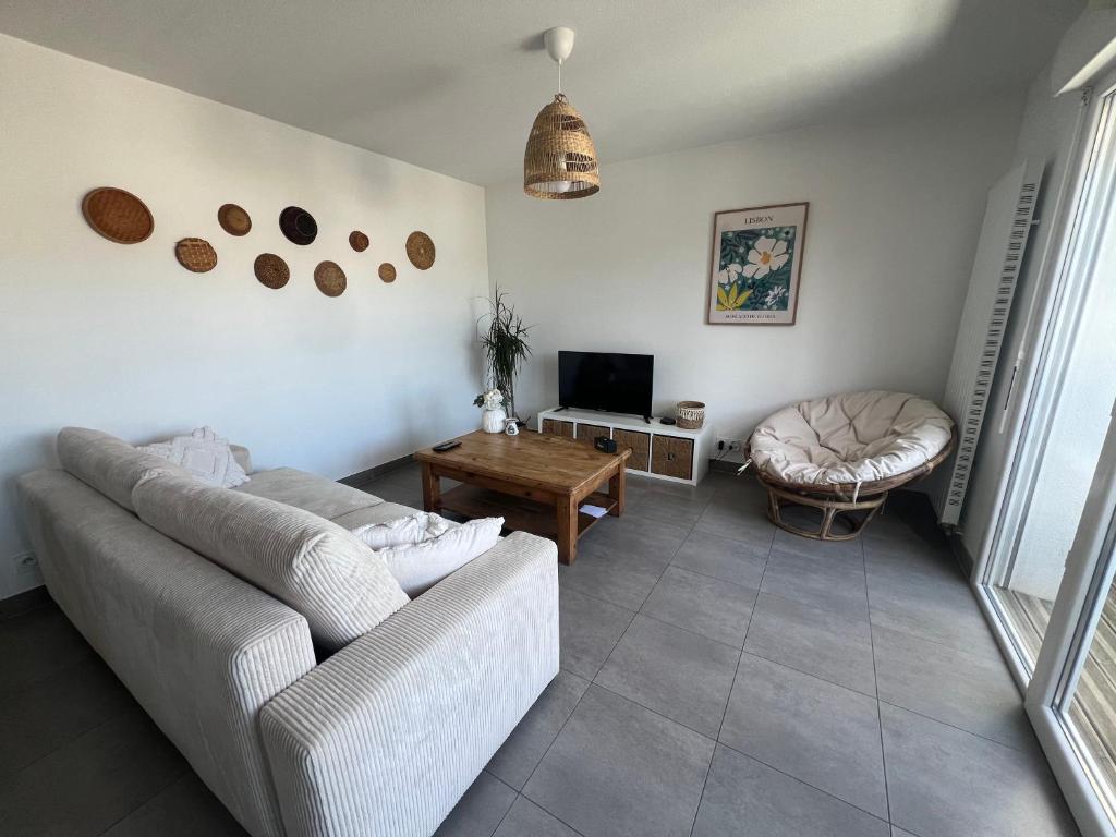 TV a/nebo společenská místnost v ubytování T3 Labenne capacité 6 couchages 10min de la plage