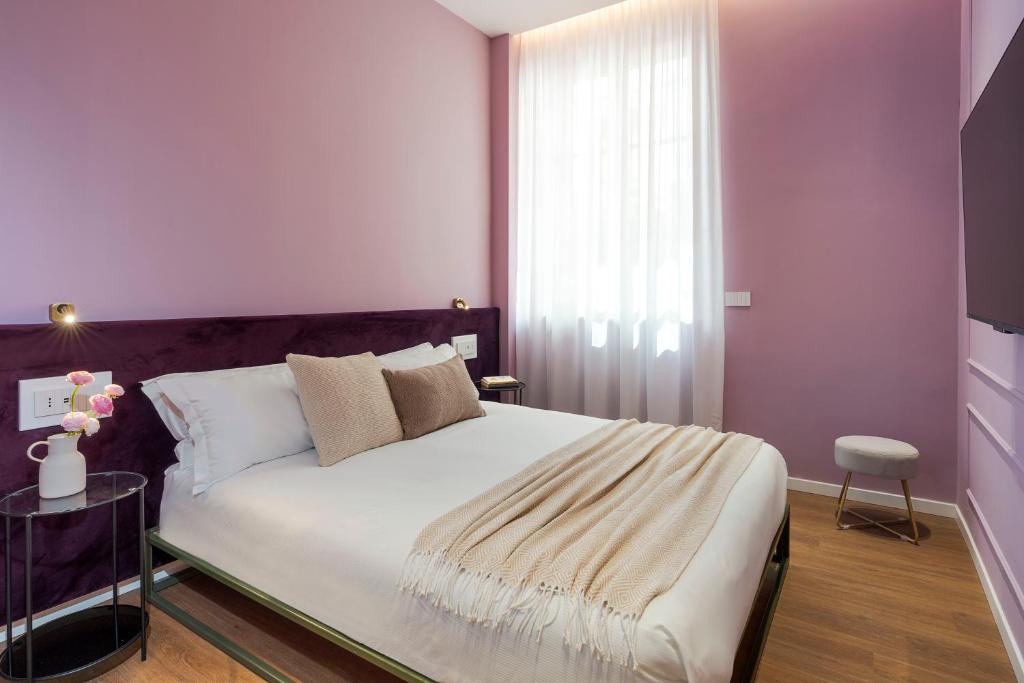 Letto o letti in una camera di Elysium Boutique Apartments - Catania