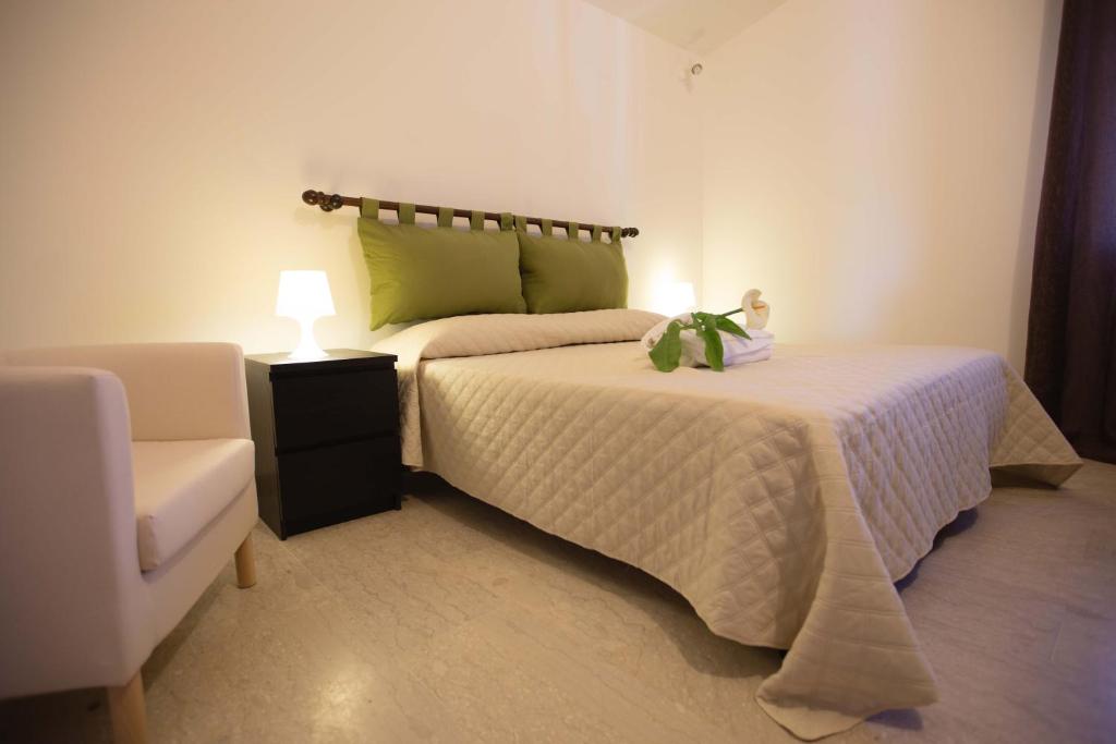 Posteľ alebo postele v izbe v ubytovaní Residence Guidaloca