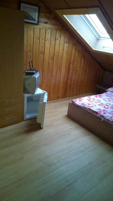 Postel nebo postele na pokoji v ubytování Pension Nika