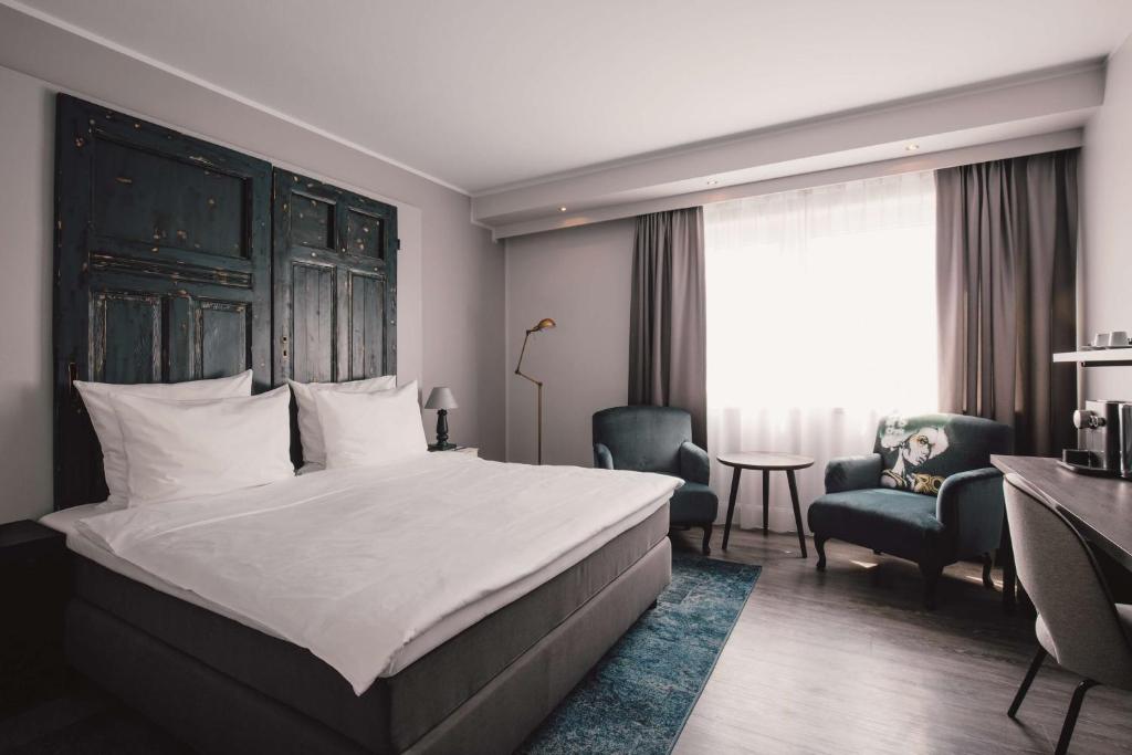 Postel nebo postele na pokoji v ubytování Hotel Berlin, Berlin, a member of Radisson Individuals