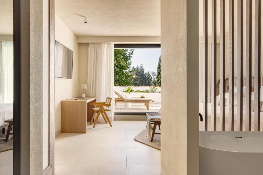 Posedenie v ubytovaní Anfitrión Villas & Suites