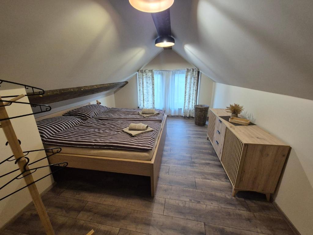 Postel nebo postele na pokoji v ubytování Vila LiMi