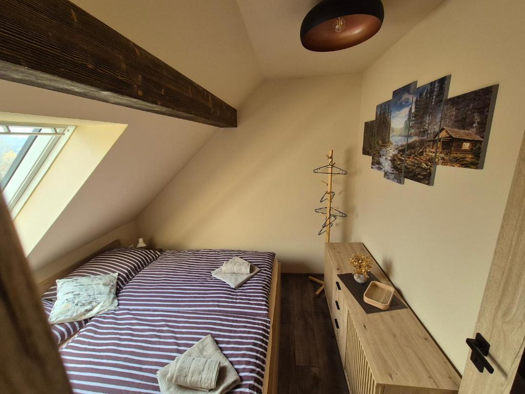 Postel nebo postele na pokoji v ubytování Vila LiMi