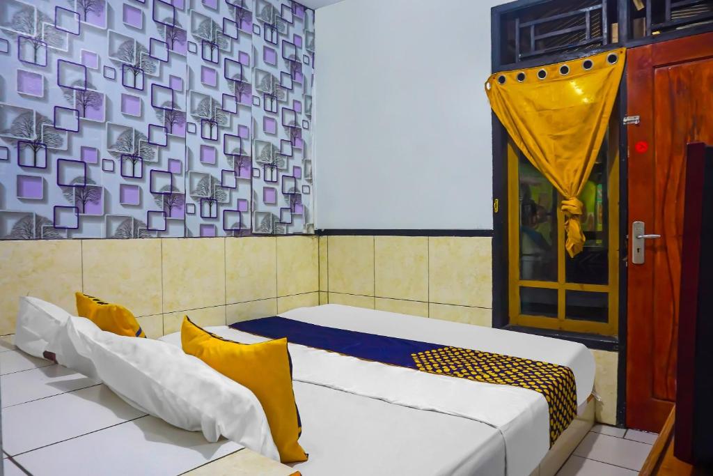 Posezení v ubytování SPOT ON 92154 Nusasari Guest House