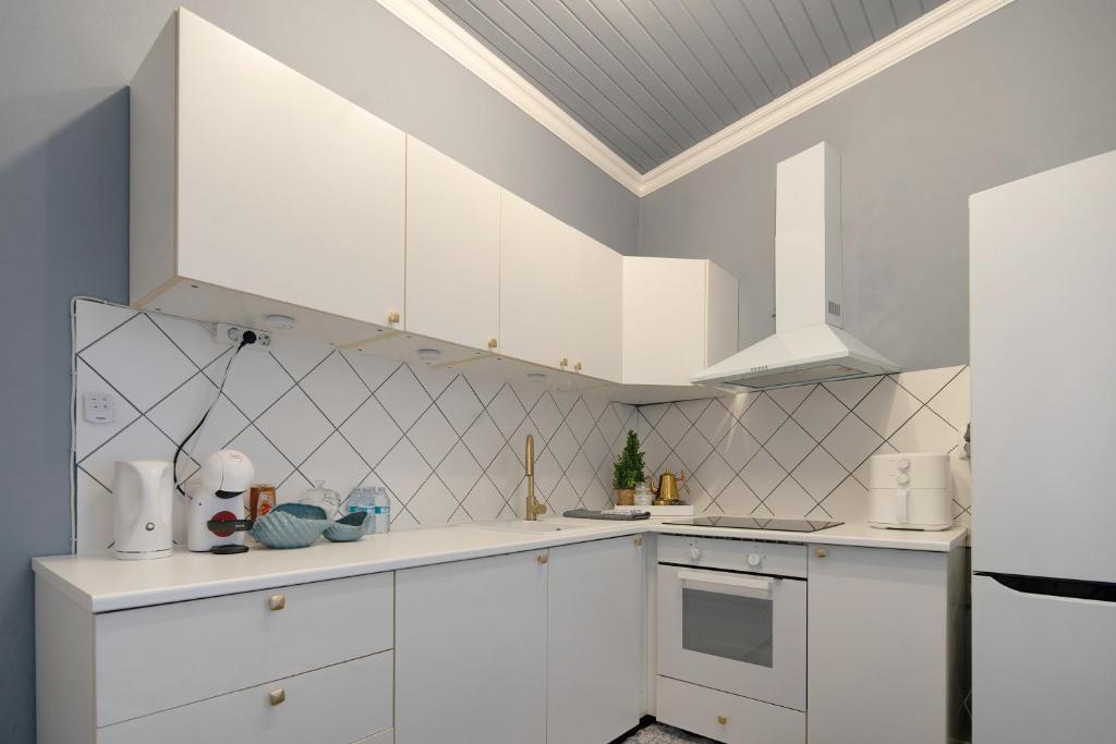 Kuchyň nebo kuchyňský kout v ubytování Pico Boutique House